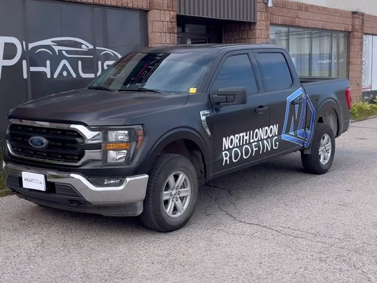 North London Roofing truck in satin black with tint and decals