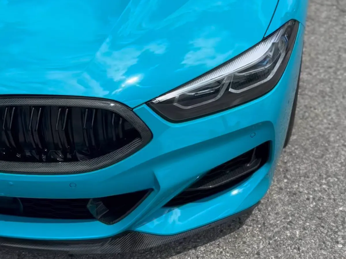 BMW 8 Series in Vinyl Frog Miami blue, ceramic coated